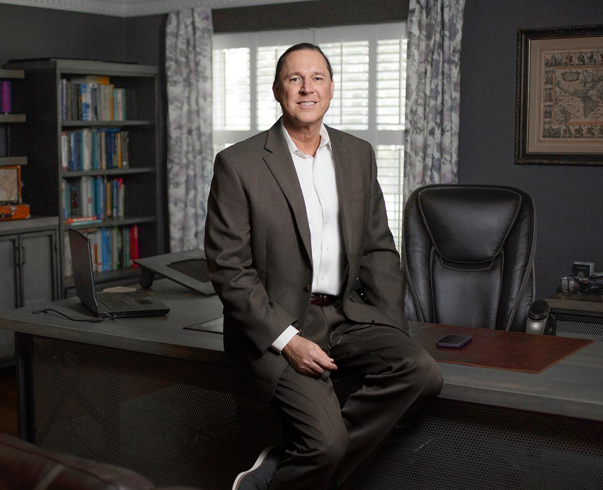 Michael Root, founder and principal of Gabriel Interactive, in his studio office